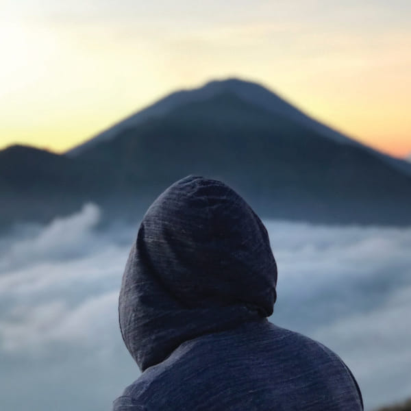 Romain Blary from the back, facing Mount Batur in Bali